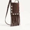 Petit sac à bandoulière Valentino Garavani Nellcôte en daim avec franges Petit sac à bandoulière Valentino Garavani Nellcôte en daim avec franges