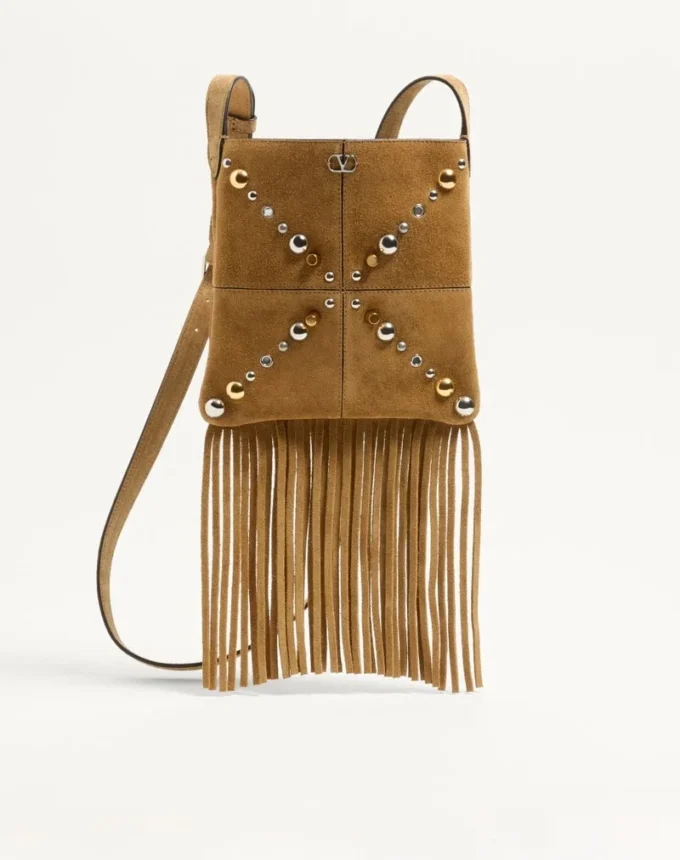 Petit sac à bandoulière Valentino Garavani Nellcôte en daim avec franges Petit sac à bandoulière Valentino Garavani Nellcôte en daim avec franges