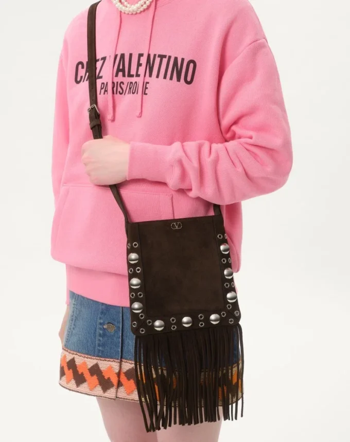 Petit sac à bandoulière Valentino Garavani Nellcôte en daim avec franges Petit sac à bandoulière Valentino Garavani Nellcôte en daim avec franges