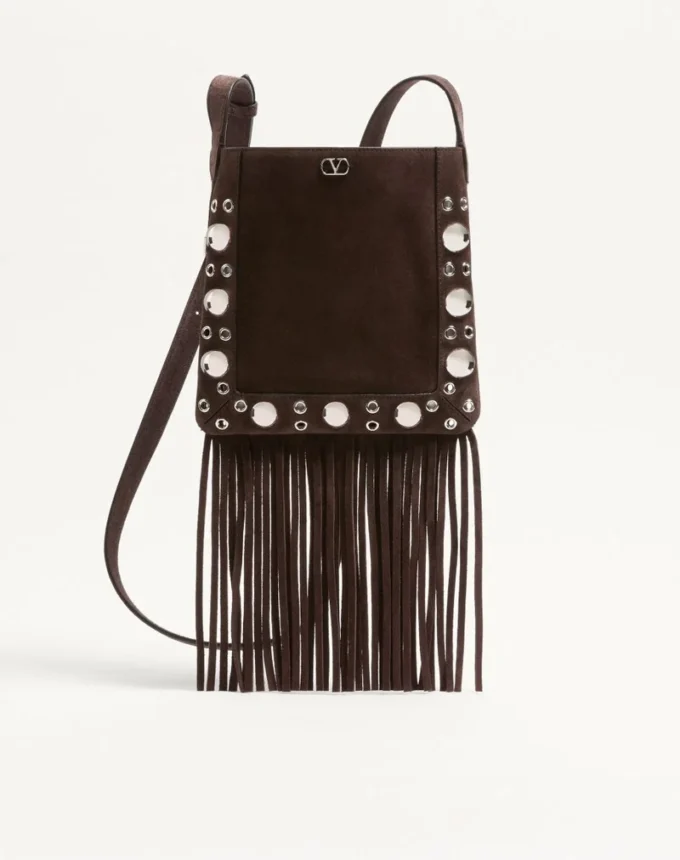 Petit sac à bandoulière Valentino Garavani Nellcôte en daim avec franges Petit sac à bandoulière Valentino Garavani Nellcôte en daim avec franges