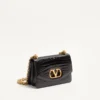 Petit sac à bandoulière Valentino Garavani Vain en cuir de crocodile Petit sac à bandoulière Valentino Garavani Vain en cuir de crocodile