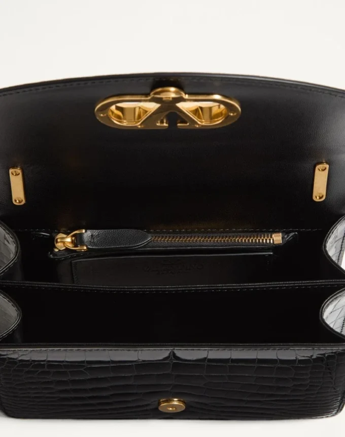 Petit sac à bandoulière Valentino Garavani Vain en cuir de crocodile Petit sac à bandoulière Valentino Garavani Vain en cuir de crocodile
