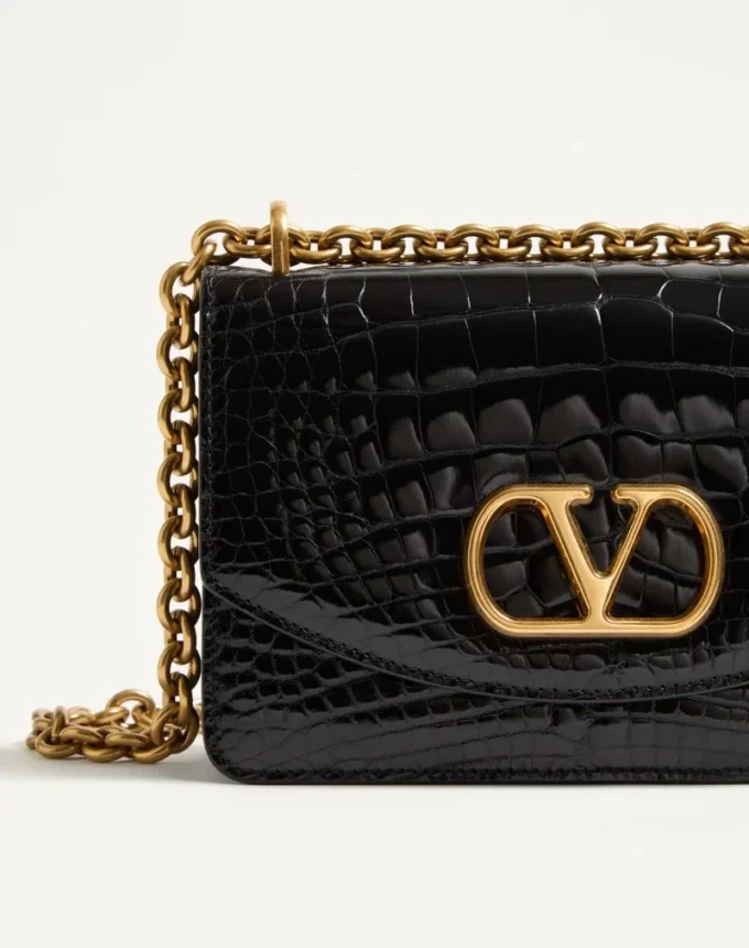Petit sac à bandoulière Valentino Garavani Vain en cuir de crocodile Petit sac à bandoulière Valentino Garavani Vain en cuir de crocodile