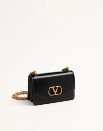 Petit sac à bandoulière Valentino Garavani Vain en cuir de veau brillant