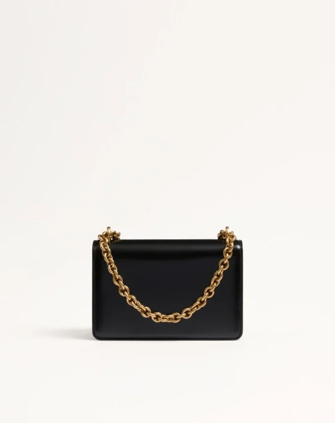 Petit sac à bandoulière Valentino Garavani Vain en cuir de veau brillant Petit sac à bandoulière Valentino Garavani Vain en cuir de veau brillant
