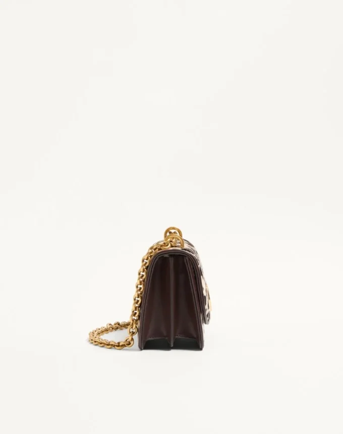Petit sac à bandoulière Valentino Garavani Vain en cuir de veau effet poney avec imprimé animalier Petit sac à bandoulière Valentino Garavani Vain en cuir de veau effet poney avec imprimé animalier