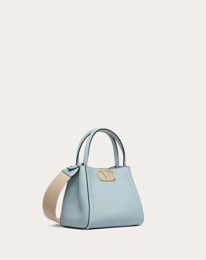 Petit sac à main Valentino Garavani Alltime en cuir de veau grainé Petit sac à main Valentino Garavani Alltime en cuir de veau grainé