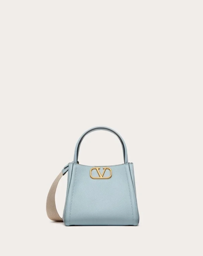Petit sac à main Valentino Garavani Alltime en cuir de veau grainé Petit sac à main Valentino Garavani Alltime en cuir de veau grainé