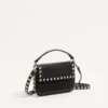 Pochette Rockstud en cuir de veau grainé