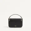 Pochette Rockstud en cuir de veau grainé