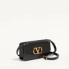 Pochette Valentino Garavani Vain en cuir de veau brillant Pochette Valentino Garavani Vain en cuir de veau brillant