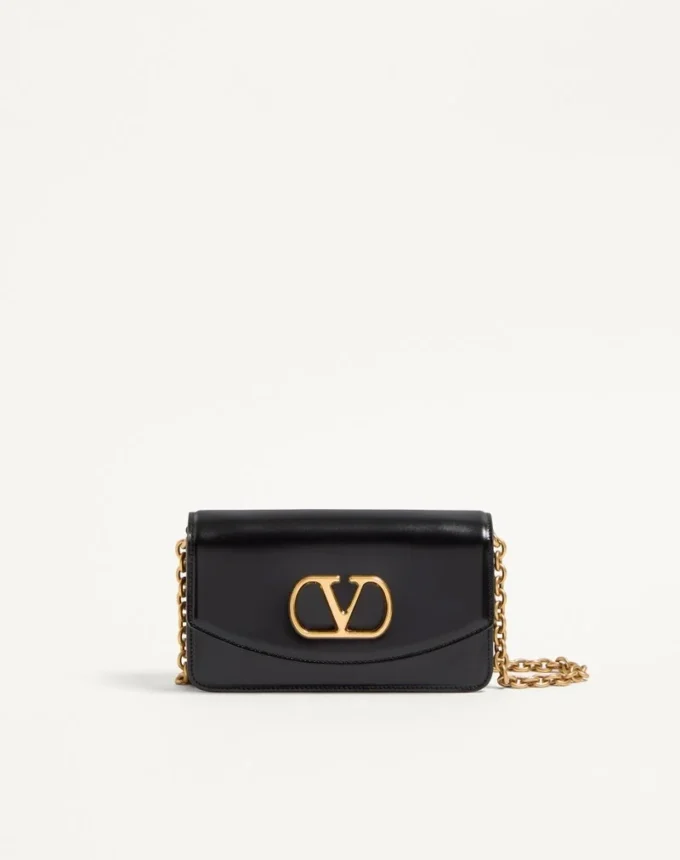 Pochette Valentino Garavani Vain en cuir de veau brillant Pochette Valentino Garavani Vain en cuir de veau brillant