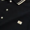 Polo en coton piqué avec patch Vlogo Polo en coton piqué avec patch Vlogo