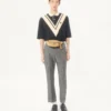 Polo en coton Valentino avec V incrusté et patch panthère brodé Polo en coton Valentino avec V incrusté et patch panthère brodé