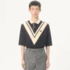 Polo en coton Valentino avec V incrusté et patch panthère brodé Polo en coton Valentino avec V incrusté et patch panthère brodé