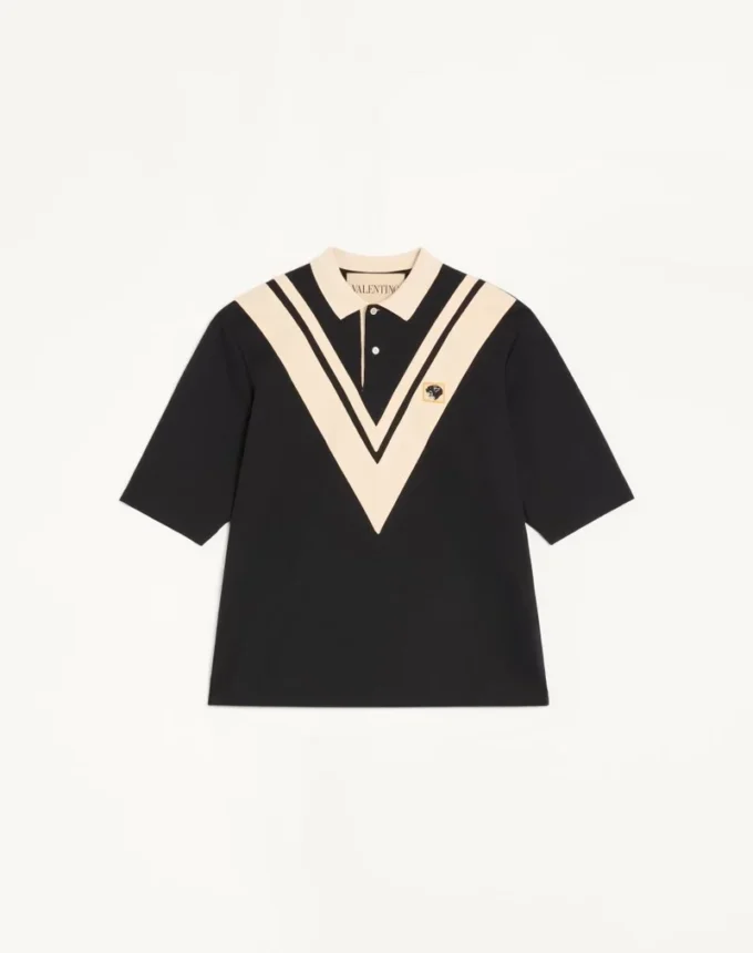 Polo en coton Valentino avec V incrusté et patch panthère brodé Polo en coton Valentino avec V incrusté et patch panthère brodé
