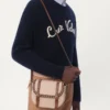 Pull en laine à col rond avec broderie Chez Valentino Pull en laine à col rond avec broderie Chez Valentino