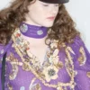 Robe en mousseline brodée avec plumes Robe en mousseline brodée avec plumes