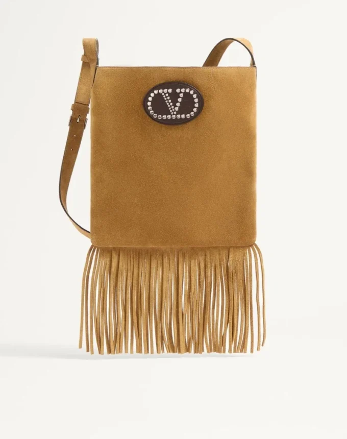 Sac à bandoulière en daim à franges Nellcôte de Valentino Garavani Sac à bandoulière en daim à franges Nellcôte de Valentino Garavani