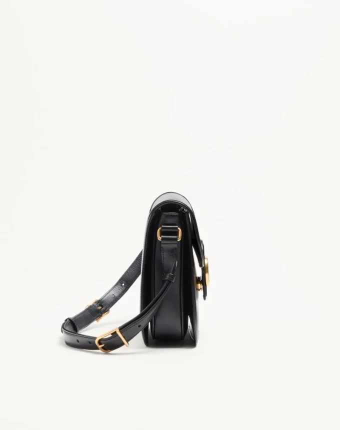 Sac à bandoulière Valentino Garavani 9To5 en cuir de veau lisse Sac à bandoulière Valentino Garavani 9To5 en cuir de veau lisse