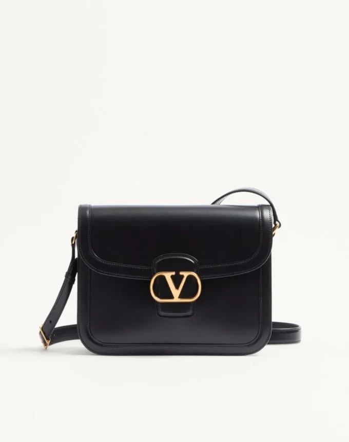 Sac à bandoulière Valentino Garavani 9To5 en cuir de veau lisse Sac à bandoulière Valentino Garavani 9To5 en cuir de veau lisse