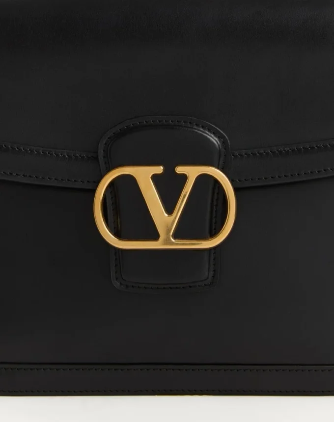Sac à bandoulière Valentino Garavani 9To5 en cuir de veau lisse Sac à bandoulière Valentino Garavani 9To5 en cuir de veau lisse