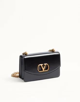 Sac à bandoulière Valentino Garavani Vain en cuir de veau brillant