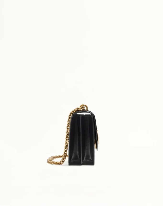 Sac à bandoulière Valentino Garavani Vain en cuir de veau brillant Sac à bandoulière Valentino Garavani Vain en cuir de veau brillant