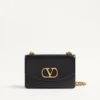 Sac à bandoulière Valentino Garavani Vain en cuir de veau brillant Sac à bandoulière Valentino Garavani Vain en cuir de veau brillant