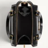 Sac bowling Valentino Garavani Vain-Case en cuir de veau brillant Sac bowling Valentino Garavani Vain-Case en cuir de veau brillant