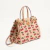 Sac cabas moyen Valentino Garavani Antibes en raphia jacquard avec motif Cherryfic Sac cabas moyen Valentino Garavani Antibes en raphia jacquard avec motif Cherryfic