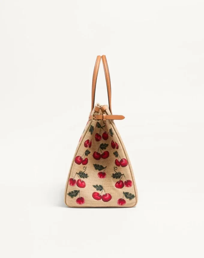 Sac cabas moyen Valentino Garavani Antibes en raphia jacquard avec motif Cherryfic Sac cabas moyen Valentino Garavani Antibes en raphia jacquard avec motif Cherryfic