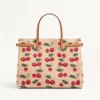 Sac cabas moyen Valentino Garavani Antibes en raphia jacquard avec motif Cherryfic Sac cabas moyen Valentino Garavani Antibes en raphia jacquard avec motif Cherryfic