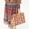 Sac cabas moyen Valentino Garavani Antibes en raphia jacquard avec motif Cherryfic Sac cabas moyen Valentino Garavani Antibes en raphia jacquard avec motif Cherryfic