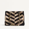 Sac cabas Valentino Garavani Laseine en python et daim à motif chevron Sac cabas Valentino Garavani Laseine en python et daim à motif chevron