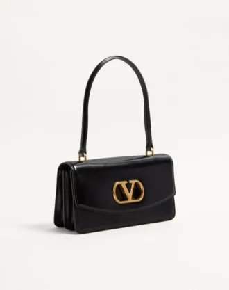Sac Valentino Garavani Vain avec poignée en cuir de veau brillant