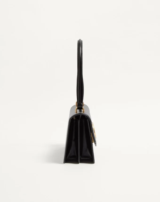 Sac Valentino Garavani Vain avec poignée en cuir de veau brillant Sac Valentino Garavani Vain avec poignée en cuir de veau brillant