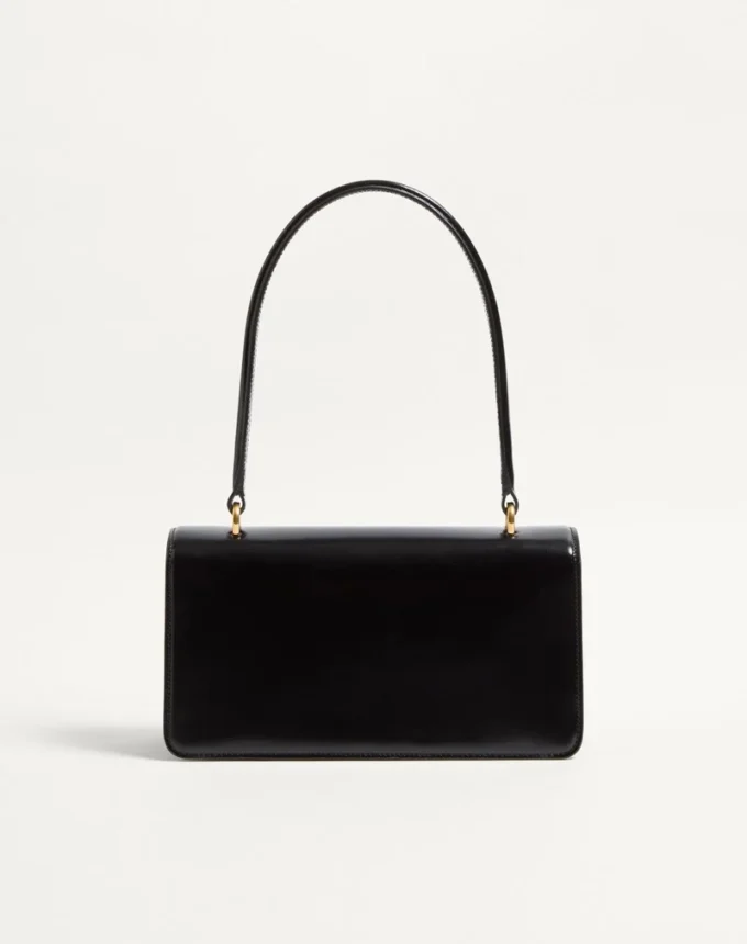 Sac Valentino Garavani Vain avec poignée en cuir de veau brillant Sac Valentino Garavani Vain avec poignée en cuir de veau brillant
