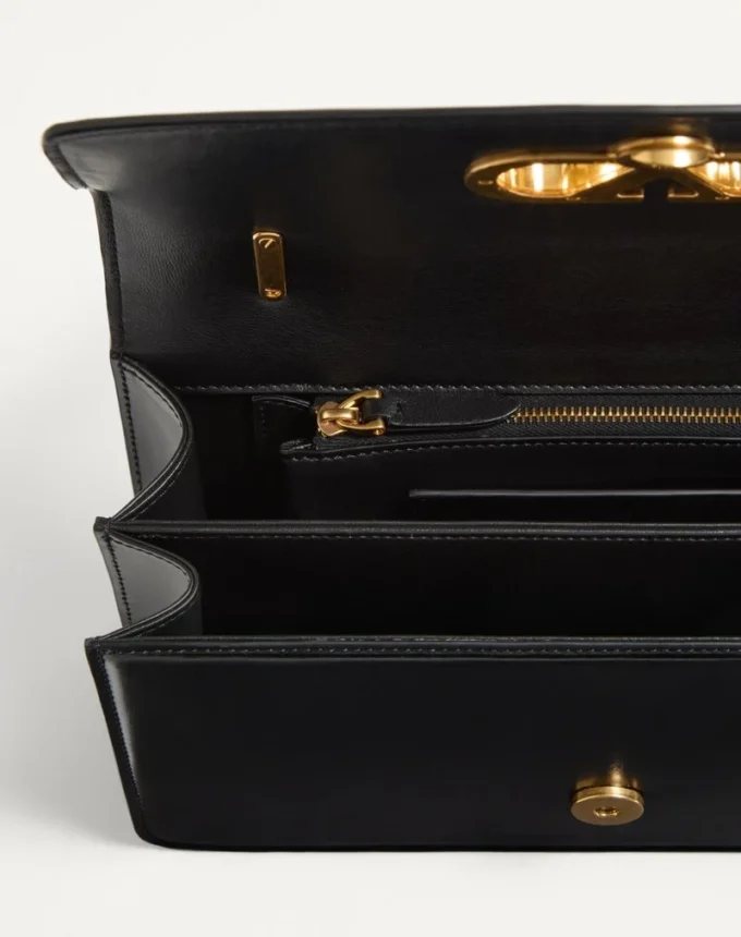 Sac Valentino Garavani Vain avec poignée en cuir de veau brillant Sac Valentino Garavani Vain avec poignée en cuir de veau brillant