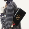 Sac Valentino Garavani Vain avec poignée en cuir de veau brillant Sac Valentino Garavani Vain avec poignée en cuir de veau brillant
