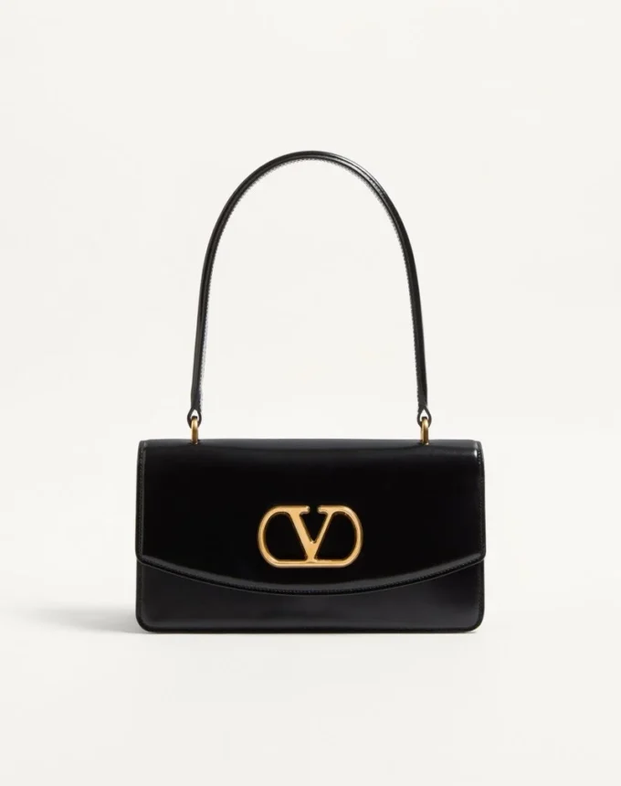 Sac Valentino Garavani Vain avec poignée en cuir de veau brillant Sac Valentino Garavani Vain avec poignée en cuir de veau brillant