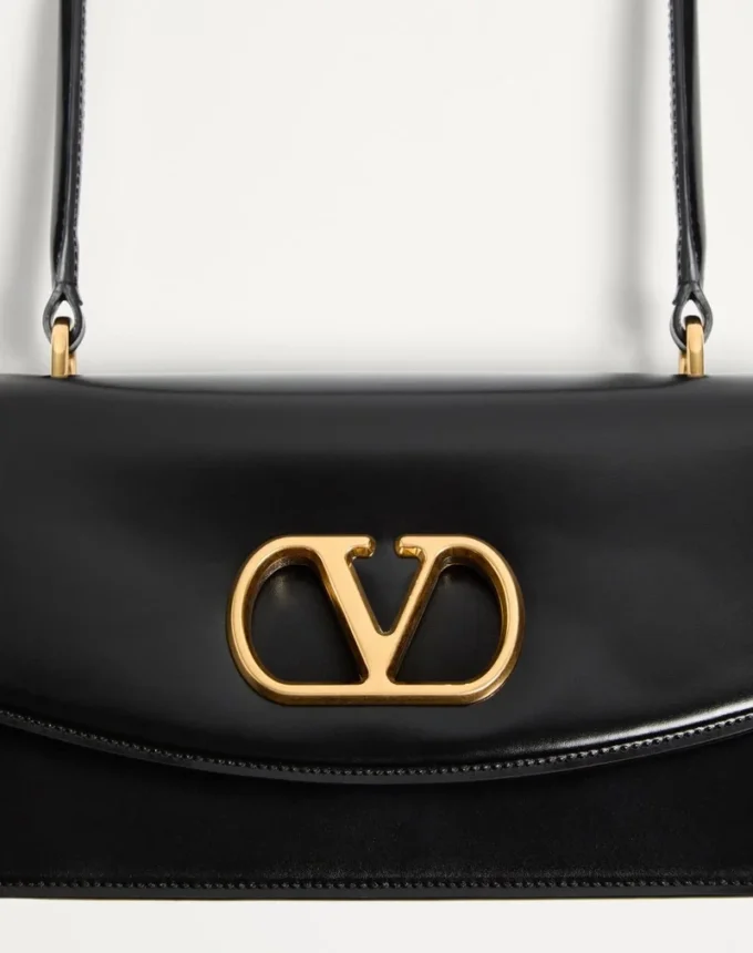 Sac Valentino Garavani Vain avec poignée en cuir de veau brillant Sac Valentino Garavani Vain avec poignée en cuir de veau brillant