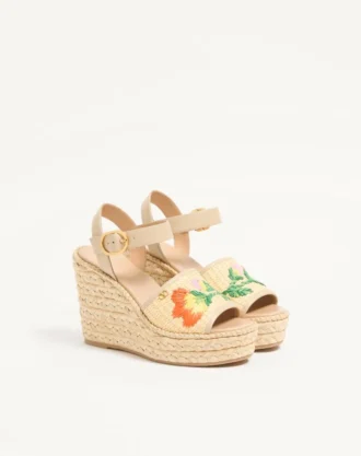 Sandales compensées en raphia Bribri avec broderies florales 115 mm Sandales compensées en raphia Bribri avec broderies florales 115 mm