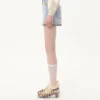 Short en denim brodé Short en denim brodé