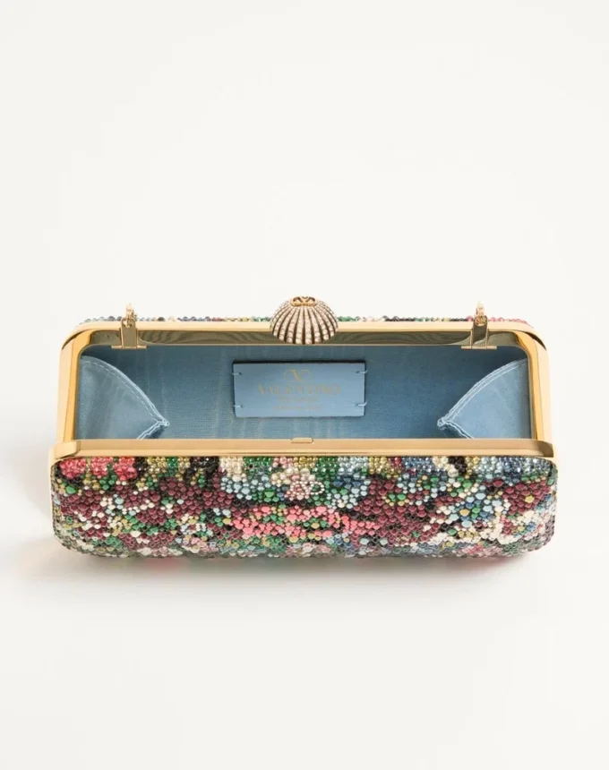 Valentino Garavani Minaudière Carry Secrets avec motif strass Apres L’Hiver Valentino Garavani Minaudière Carry Secrets avec motif strass Apres L’Hiver
