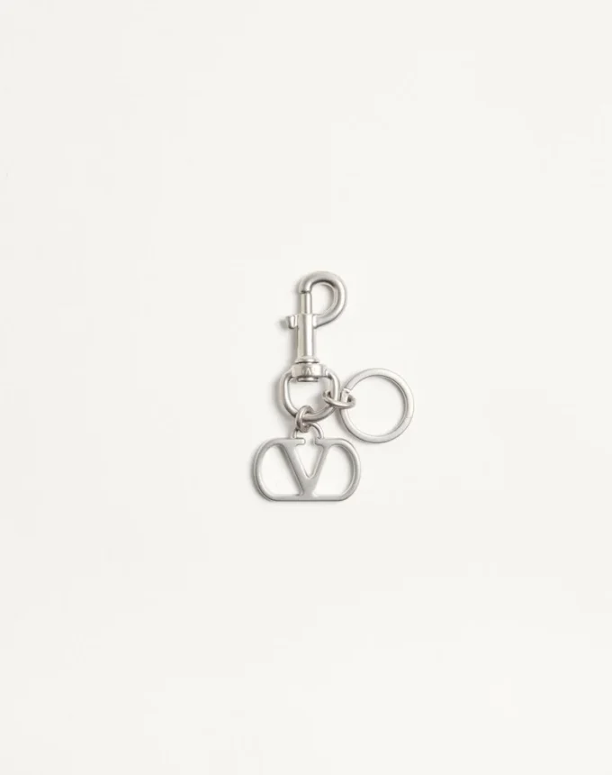 Valentino Garavani Vlogo Signature Charm métallique pour sac avec porte-clés Valentino Garavani Vlogo Signature Charm métallique pour sac avec porte-clés