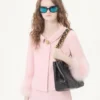Veste en crêpe couture avec plumes Veste en crêpe couture avec plumes
