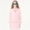 Veste en crêpe couture avec plumes Veste en crêpe couture avec plumes