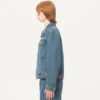 Veste en denim avec broderies de perles et bords imprimés Veste en denim avec broderies de perles et bords imprimés
