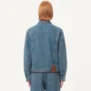 Veste en denim avec broderies de perles et bords imprimés Veste en denim avec broderies de perles et bords imprimés